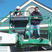 Andri and Paul replacing vents at Seneca Woods Appartments.